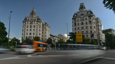 Time lapse of traffic and art nouveau buildings in Piazza Piemonte, Milan Stock Footage 90090579