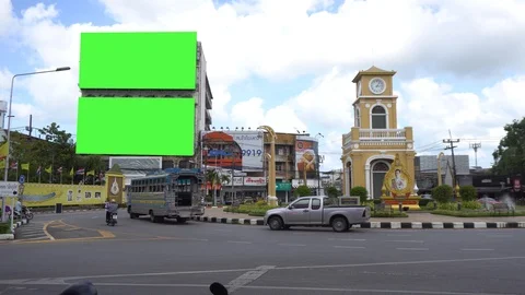 Time lapse traffic and phuket town background with green panel banner Stock Footage 124377451