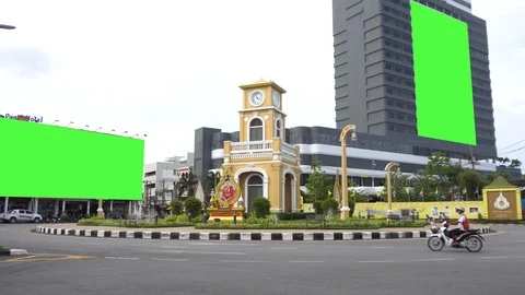 Time lapse traffic and phuket town background with green panel banner Stock Footage 124377612