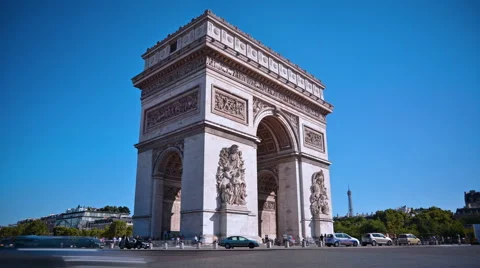 Time lapse of traffic around Arch of Triumph on a sunny day in Paris, France. Stock Footage 68310315