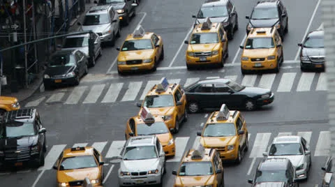 Time lapse of traffic congestion and pedestrians on a busy New York street Stock Footage