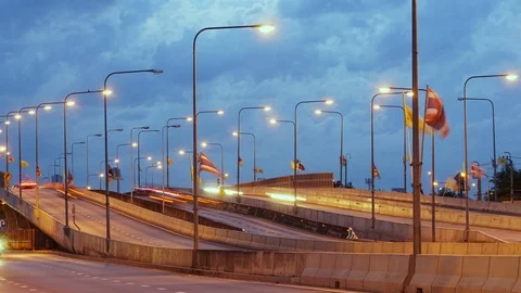 TIME LAPSE: Traffic Day to Night in THAILAND. 4K Stock Footage 110858483