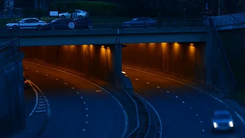 Time lapse traffic driving through leeds city centre at twilight united kingdom Stock Footage 73296136