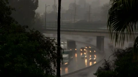 Time lapse of traffic on freeway during the rain Stock Footage 45295819