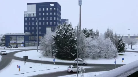 Time Lapse Traffic Going Round Roundabout In Snow Day Stock Footage 145757587