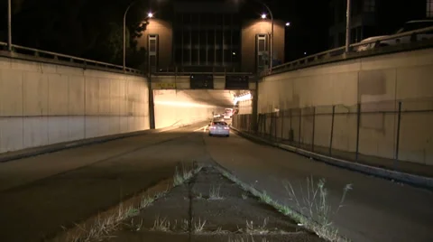 Time lapse of traffic going into a tunnel at night Stock Footage 34210985