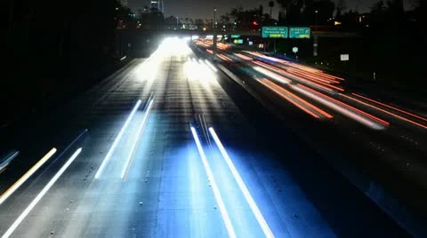 Time Lapse of Traffic heading towards Los Angeles City at Night Stock Footage 11979037
