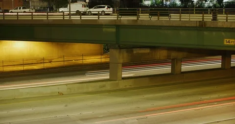 Time lapse of traffic on Highway 101 and Western Ave during night in Los Stock Footage 115094257