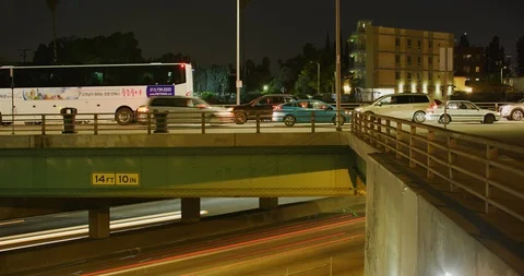 Time lapse of traffic on Highway 101 and Western Ave during night in Los Stock Footage 115818232