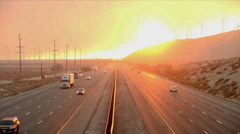 Time Lapse of Traffic on Highway with Fire Smoke Sunset Stock Footage 28322691