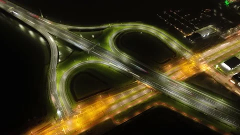 Time lapse of traffic intersection at night. Rush hour busy road. Busy Stock Footage 228047175