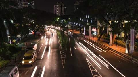 Time lapse of traffic jam on the highway with city view in the Jakarta city area 動画素材 300073066