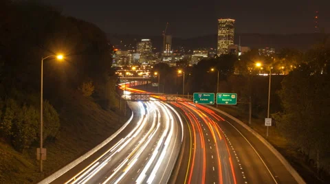 Time Lapse of Traffic Light Trails on I84 Freeway with Portland Skyline at Night Stock Footage 43560440