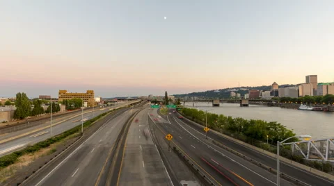 Time Lapse of Traffic Light Trails and Moonrise in City Portland  1080p Stock Footage 43912676
