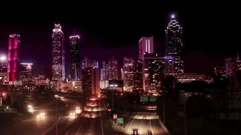 Time lapse of traffic moving in and out of downtown Atlanta, slider shot. Stock Footage 72316981