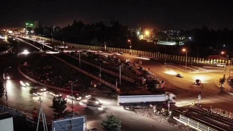 Time lapse of traffic moving through roundabout in Addis Ababa Ethiopia at night Stock Footage 72415608