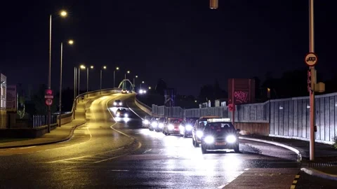 Time lapse of traffic at night at intersection Stock Footage 142849741