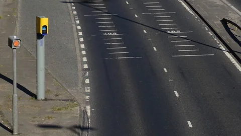 Time lapse traffic passing speed camera leeds yorkshire united kingdom Stock Footage 90373752