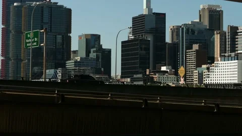 Time lapse traffic passing Sydney skyscrapers 4K Video stock 160384998