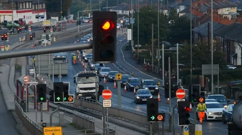Time lapse traffic queueing at roadworks in the city of leeds united kingdom Stock Footage