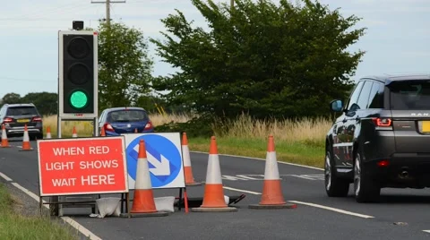 Time lapse traffic queuing at roadworks near north duffield yorkshire uk Stock Footage 52535310