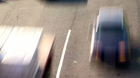 Time lapse of traffic rushing by on highway Stock Footage