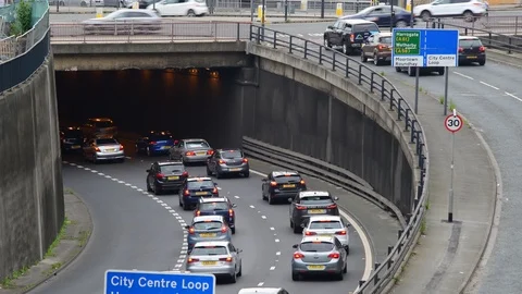 Time lapse traffic rushour leaving leeds city centre united kingdom Stock Footage 110835807