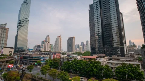 Time lapse of traffic at Sathon and Silom District central business Bangkok City Stock Footage 107678710