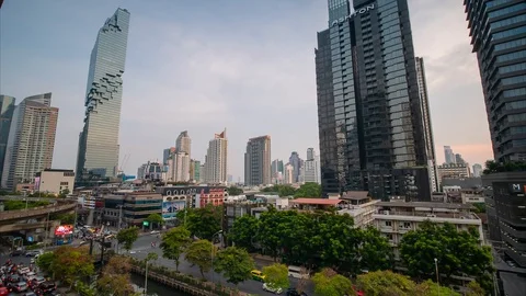Time lapse of traffic at Sathon and Silom District central business Bangkok City Stock Footage 107678741
