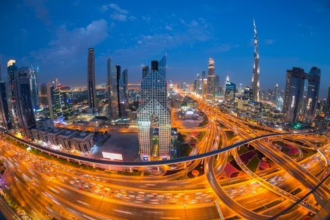 Time lapse  of traffic on Sheikh Zayed road in front of Dusit Dubai Hotel- Dubai Stock Footage