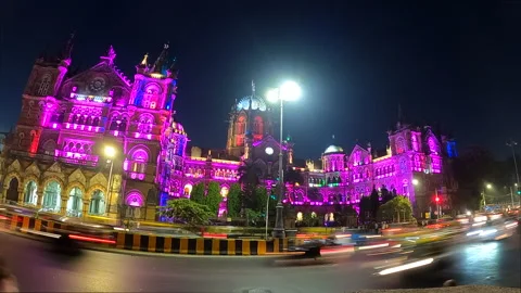 TIME LAPSE OF TRAFFIC AT UNESCO WORLD HERITAGE SITE CST  BUILDING IN MUMBAI Vídeos de archivo 164862402