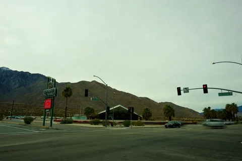 Time-lapse of traffic at the visitor center in Palm Springs, California Stock Footage 115818630