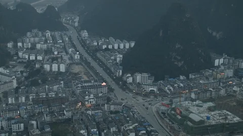 Time Lapse of traffic in Yangshuo. Small town surrounded by karsts. Stock Footage 103470162