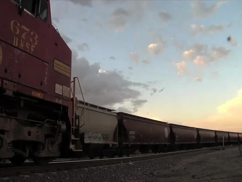 Time lapse of train and sunset Stock Footage 29897152