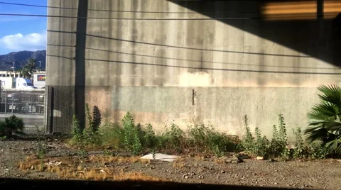 Time lapse of train taking off through the city of Burbank, CA Stock Footage 54473446