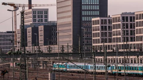 Time Lapse of Trains passing by close in a big city Stock Footage 165559852