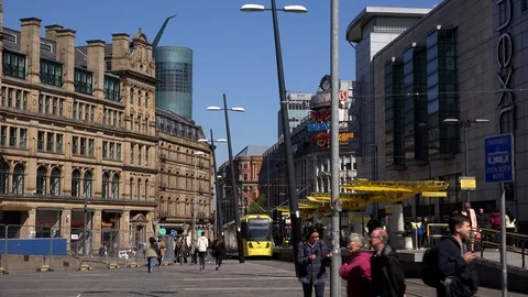 Time lapse of trams and people Manchester city centre UK England 4K Video stock 106988174