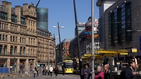 Time lapse of trams and people Manchester city centre UK England 4K Stock Footage 106989549