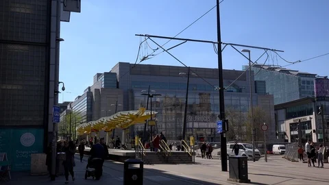 Time lapse of trams and people Manchester city centre UK England 4K Video stock 106992006