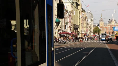 Time Lapse of Trams, Traffic &amp; People on a Busy Street in Amsterdam Stock Footage 59979397
