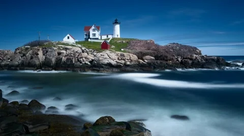 Time lapse of transition from high to low tide at Nubble Light House Stock Footage 63324409