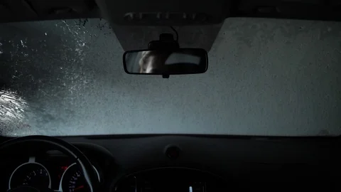 Time lapse, travel through an automatic car wash, shooting from the salon. 4K Stock Footage 107826569