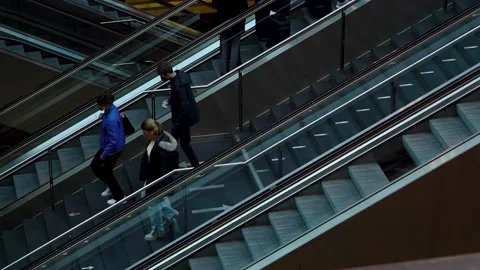 Time lapse of travelers using escalator and normal stairs Stock Footage 231368086