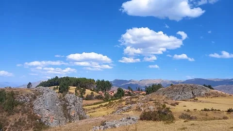 Time lapse of trees and rocks with cloudy sky Stock Footage 293094803