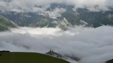 Time-lapse of Trinity Church in Kazbegi Georgia with clouds movement Stock Footage 248614028