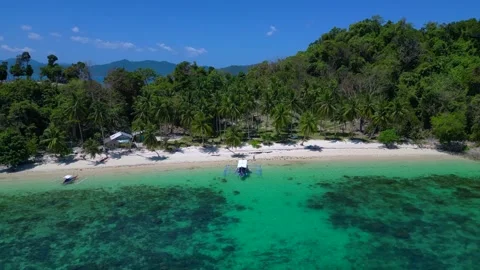 Time lapse Tropical beach with clear water and outrigger boat. Tremendous Stock Footage 344497069