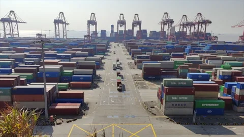 Time Lapse of Trucks Carrying Containers At A Deepwater Port Stock Footage 166956295