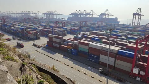 Time Lapse Of Trucks Carrying Containers At A Deepwater Port Stock Footage 166958684