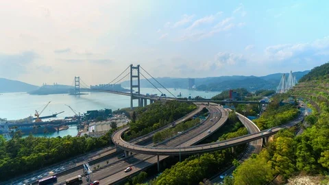 Time lapse of Tsing Ma Bridge. Highways in Hong kong with structure of suspen Video stock 105682142