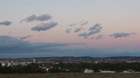 Time-lapse of twilight clouds over Ceske Budejovice city during blue hour, .. 스톡 동영상 344885421